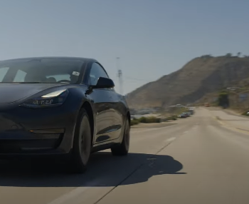 tesla on open road