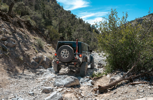A jeep on a gravel path - Sailun Tires