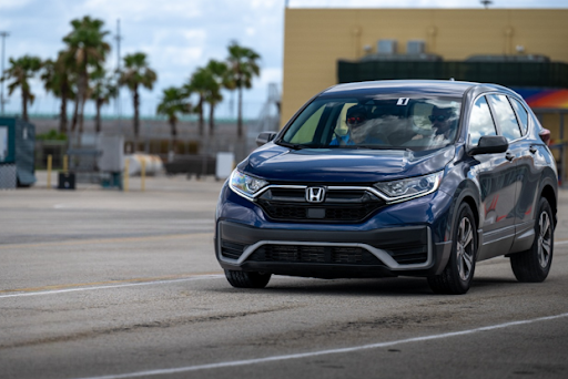 A blue car on the road - Sailun Tires