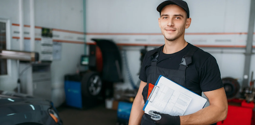 A man in a mechanic shop - Sailun Tires