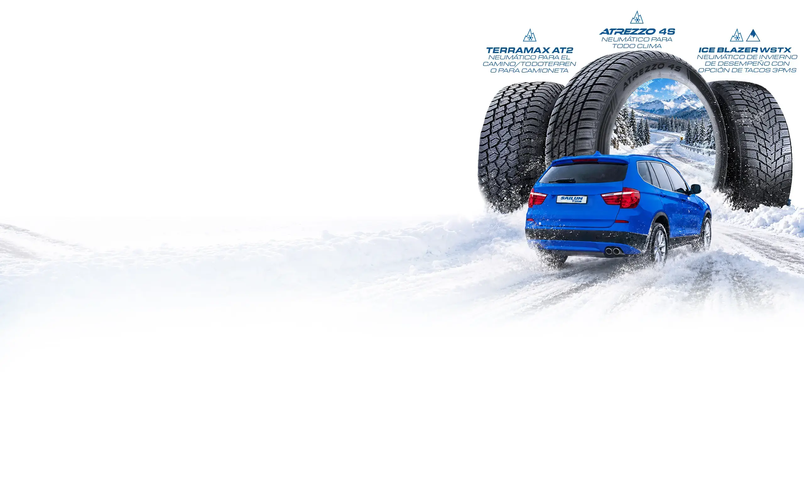 Banner promocional de invierno con tres modelos de neumáticos Sailun—Terramax AT2, Atrezzo 4S e Ice Blazer WSTX—detrás de un SUV azul que circula por una carretera nevada. Un paisaje montañoso invernal aparece a través del neumático central, con terreno cubierto de nieve en primer plano.